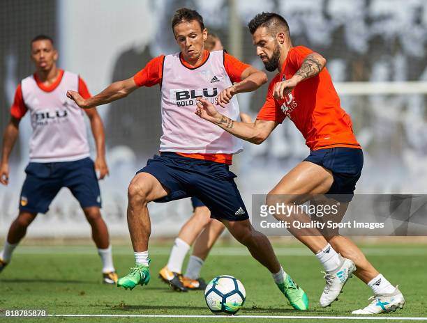 Alvaro Negredo of Valencia dispute the ball with Nemanja Maksimovic of Valencia during the pre-season training session at Paterna Training Centre on...