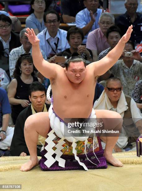 Mongolian yokozuna Hakuho performs the 'Dohyo-iri' ring purification ritual during day eleven of the Grand Sumo Nagoya Torunament at Aichi Prefecture...