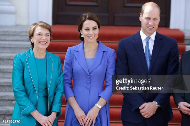First Lady Elke Buedenbender greets Catherine, Duchess of Cambridge and Prince William, Duke of Cambridge as they arrive at Bellevue Castle on the...