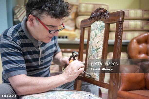 small business upholsterer laboratory: disassembling antique chair - break into small pieces imagens e fotografias de stock
