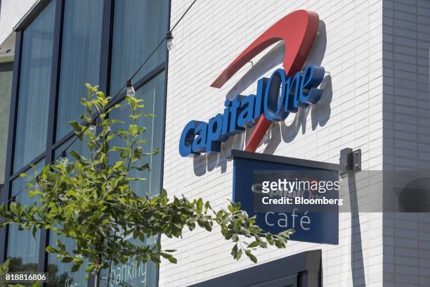 Signage is displayed on the exterior of a Capital One Financial Corp. Cafe branch in Walnut Creek, California, U.S., on Tuesday, July 18, 2017....