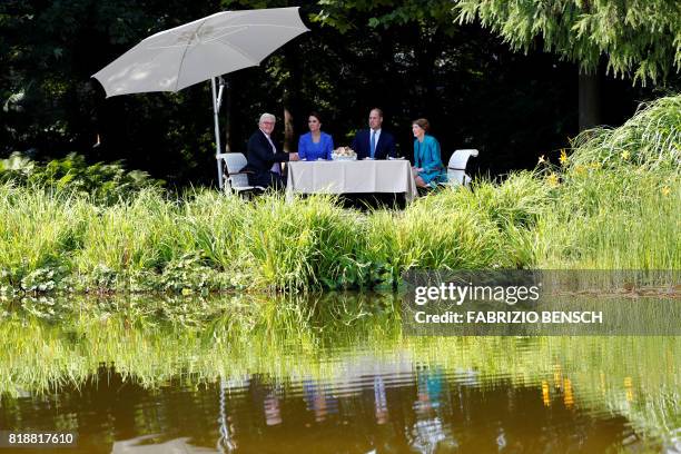 Britain's Prince William, Duke of Cambridge , his wife Kate, the Duchess of Cambridge and German President Frank-Walter Steinmeier and his wife Elke...