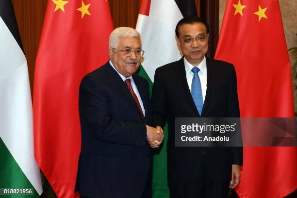 Palestinian President Mahmoud Abbas meets with Chinese Prime Minister Li Keqiang during his official visit in Beijing, China on July 19, 2017.