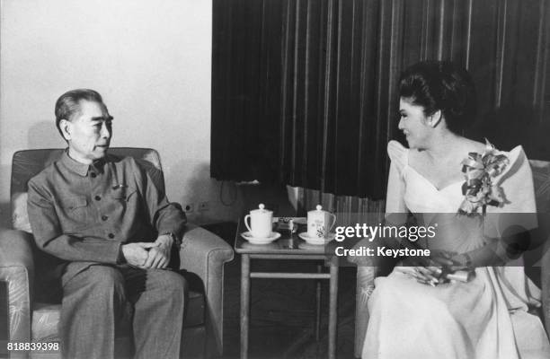 Zhou Enlai , Premier of the People's Republic of China, receives a visit from Imelda Marcos, wife of the President of the Philippines, during his...