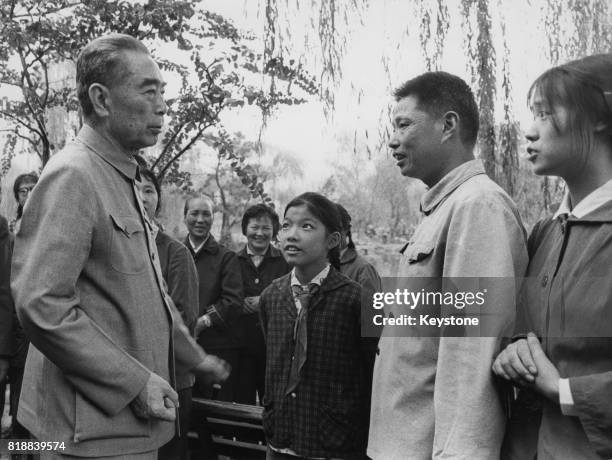 Zhou Enlai , Premier of the People's Republic of China, speaking with the people, 1973.