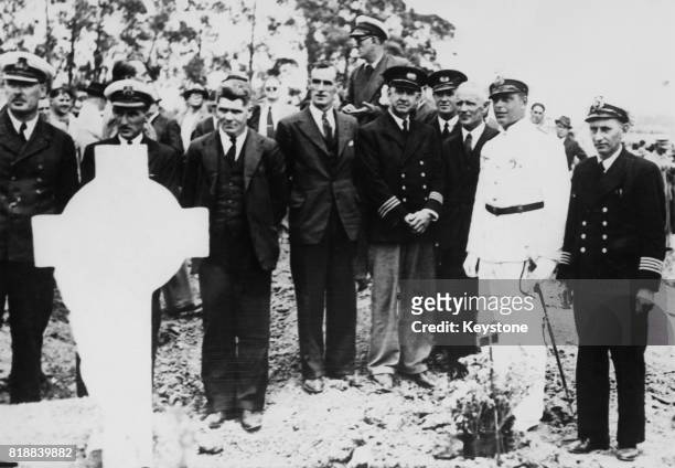 British mercantile officers who were held prisoner aboard the German cruiser 'Admiral Graf Spee' during the Battle of the River Plate, attend the...