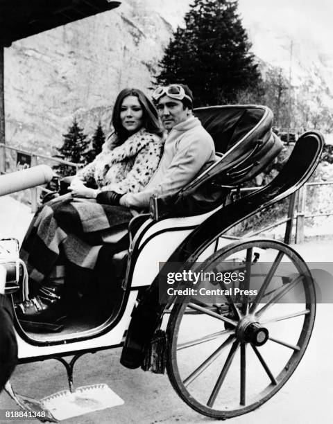 Actors George Lazenby and Diana Rigg on the set of the James Bond film 'On Her Majesty's Secret Service' at Murren, Switzerland, 11th December 1968.