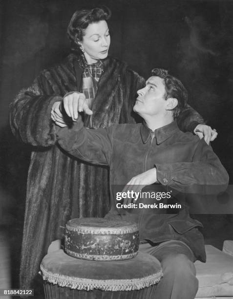 British actress Vivien Leigh with co-star Ronald Lewis, rehearsing for the play 'South Sea Bubble' at the Globe Theatre in London, 25th February 1956.