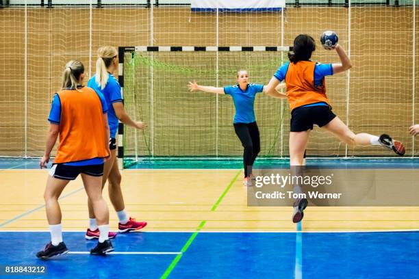 female handball players during training session - court handball bildbanksfoton och bilder