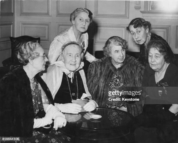 Six suffragettes attend a party to celebrate the golden wedding of Lord and Lady Pethick-Lawrence, pioneers of the Women's Suffrage movement, UK, 2nd...