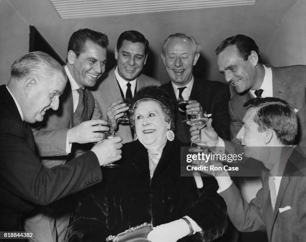 From left to right, Leslie Macdonnell, Ron Randell, Craig Stevens, Richard Hearn, Dickie Henderson and Norman Vaughan raise a glass to 80-year-old...