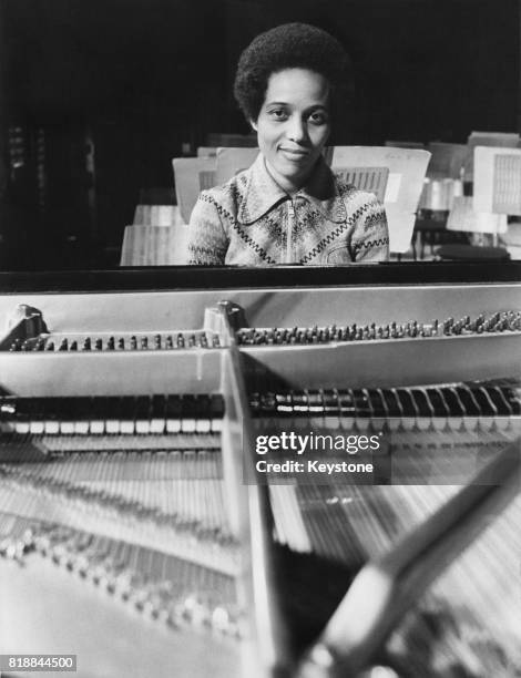 Jamaican pianist Nerine Barrett rehearses for that night's concert at the Royal Festival Hall in London, 25th February 1975. She will be playing...