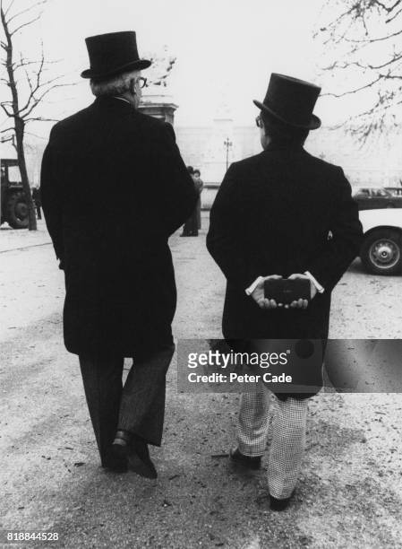 Comedy duo Ronnie Barker and Ronnie Corbett leaving Buckingham Palace in London, having both received an OBE, 7th February 1978.