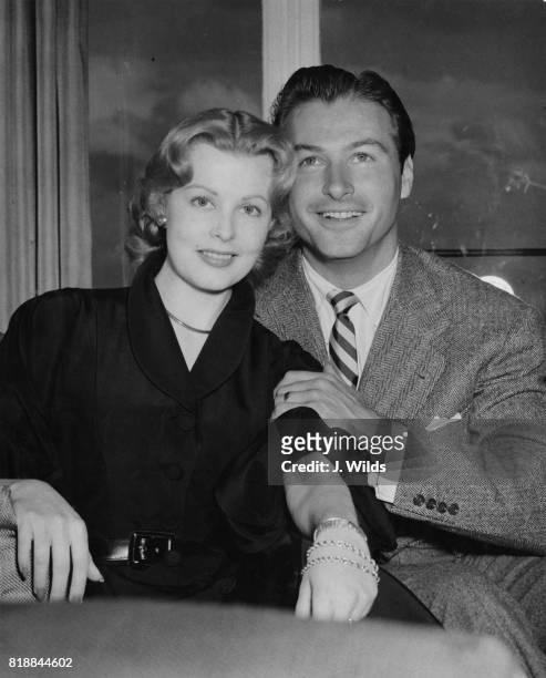 American actor Lex Barker and his wife, actress Arlene Dahl, during a press reception at the Savoy Hotel in London, 22nd May 1951.