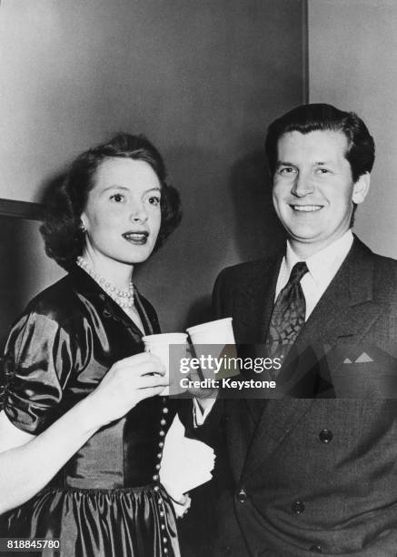 Actress Deborah Kerr and her husband, studio executive and former RAF fighter ace Tony Bartley stop for coffee after taking part in the Screen Guild...