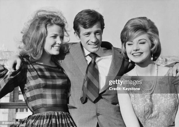 French actor Jean-Paul Belmondo with actresses Alexandra Stewart and Sylva Koscina , his co-stars in the film 'Les Distractions', , 31st January 1960.