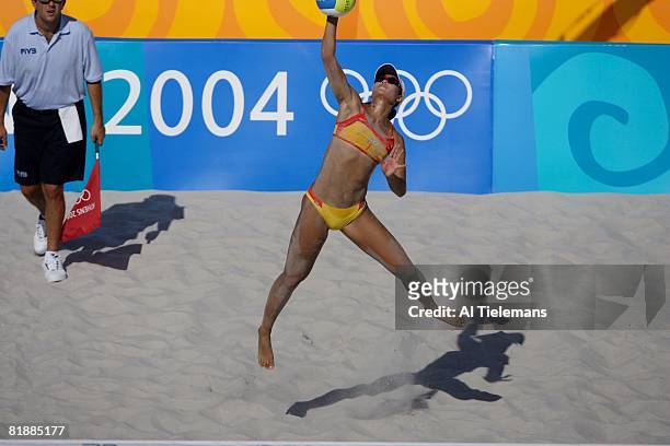 Beach Volleyball: 2004 Summer Olympics, China Tian Jia in action, serve during Preliminary Round with teammate Wang Fei at Olympic Beach Volleyball...