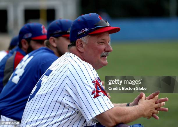 Chatham A's manager John Schiffner sits with players before the start of a game in Chatham MA on Jul. 12, 2017. He is stepping down after 25 years.