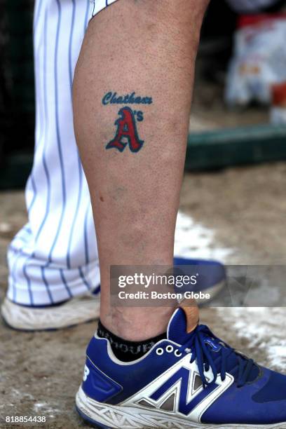Chatham A's manager John Schiffner shows the team logo tattooed on his leg in Chatham, MA on Jul. 12, 2017. Schiffner is stepping down after 25 years.