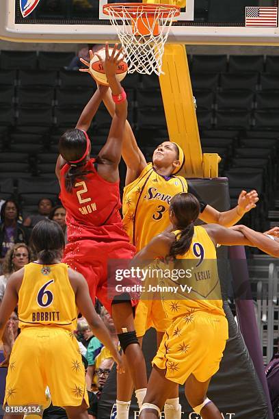 Candace Parker of the Los Angeles Sparks blocks the shot of Michelle Snow of the Houston Comets during their game on July 9, 2008 at Staples Center...