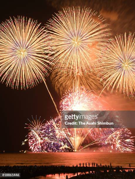 Fireworks explode during the Kamakura Fireworks Festival on July 19, 2017 in Kamakura, Kanagawa, Japan.