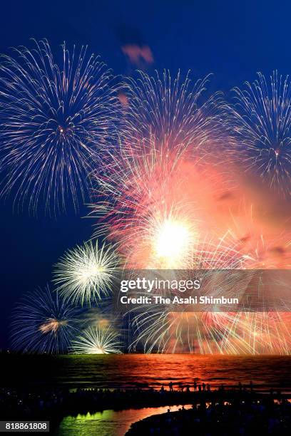 Fireworks explode during the Kamakura Fireworks Festival on July 19, 2017 in Kamakura, Kanagawa, Japan.