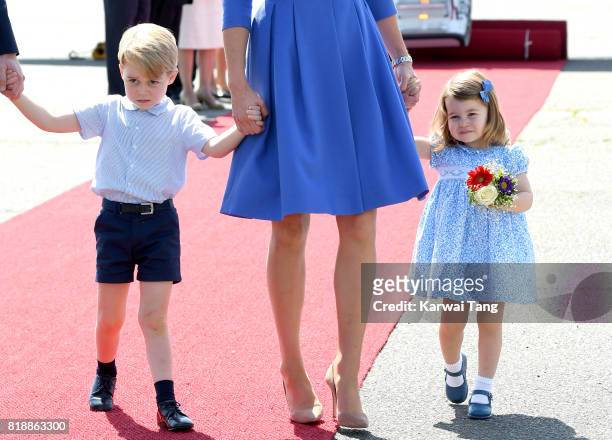 Catherine, Duchess of Cambridge, Prince George and Princess Charlotte arrive at Berlin's Tegel Airport during an official visit to Poland and Germany...
