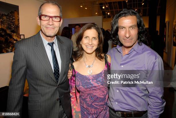 Dominique Jam, Kim Allouche and Eric Allouche attend Opera Gallery Opening: Voigt, Monet and Vukelic at Opera Gallery on April 15, 2010 in New York...
