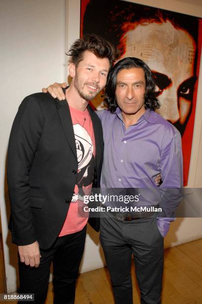 Andre Monet and Eric Allouche attend Opera Gallery Opening: Voigt, Monet and Vukelic at Opera Gallery on April 15, 2010 in New York City.