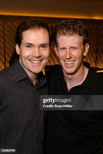 Cast members actors Jonathan Crombie and Mark Ledbetter pose during the party for the opening night performance of "The Drowsy Chaperone" held at the...