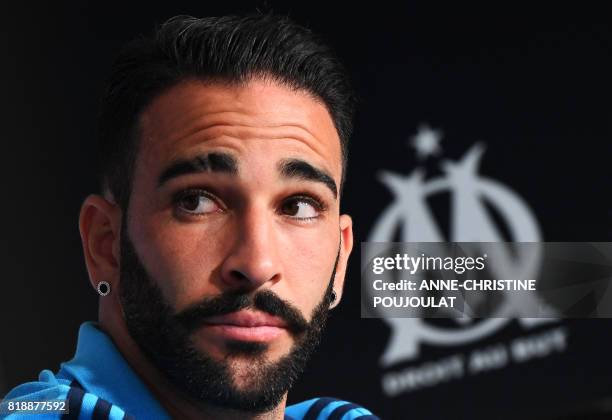 Olympique de Marseille's new French defender Adil Rami attends a press conference on July 19 in Marseille, southeastern France, following his...