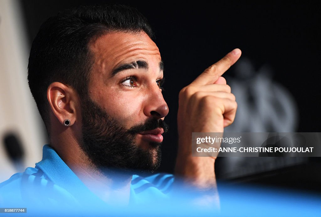 Adil Rami Fra Olympique de Marseille's new French defender Adil Rami gestures... News ...