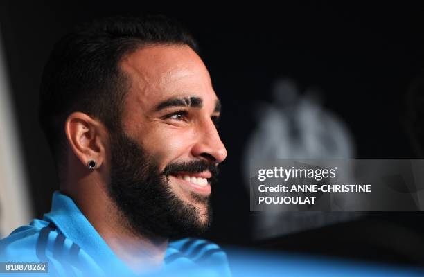 Olympique de Marseille's new French defender Adil Rami attends a press conference on July 19 in Marseille, southeastern France, following his...