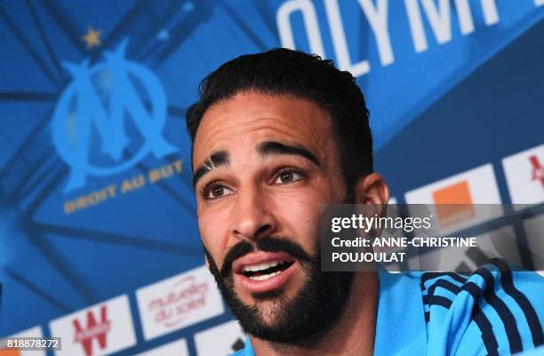 Olympique de Marseille's new French defender Adil Rami attends a press conference on July 19 in Marseille, southeastern France, following his...