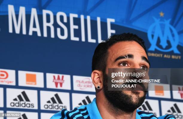 Olympique de Marseille's new French defender Adil Rami attends a press conference on July 19 in Marseille, southeastern France, following his...