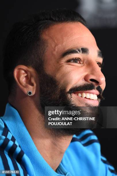 Olympique de Marseille's new French defender Adil Rami attends a press conference on July 19 in Marseille, southeastern France, following his...