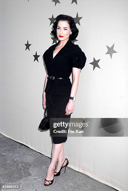 Dita Von Teese attends the Paris Fashion Week - Spring/Summer 2008 - Ready to Wear - Chanel - Photocall and Front Row Grand Palais on October 5,2007...