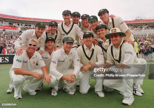 The Australian team pose for for a group photograph after winning the 1st Test match between England and Australia by an innings and 118 runs at...