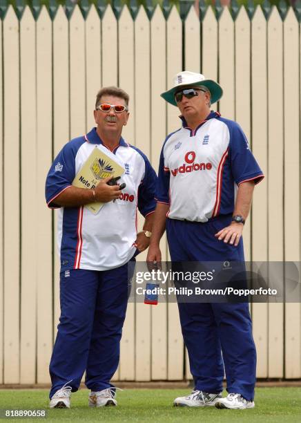 England coach Duncan Fletcher talks with Academy coach Rod Marsh during a nets session before the 2nd Test match between Australia and England at the...