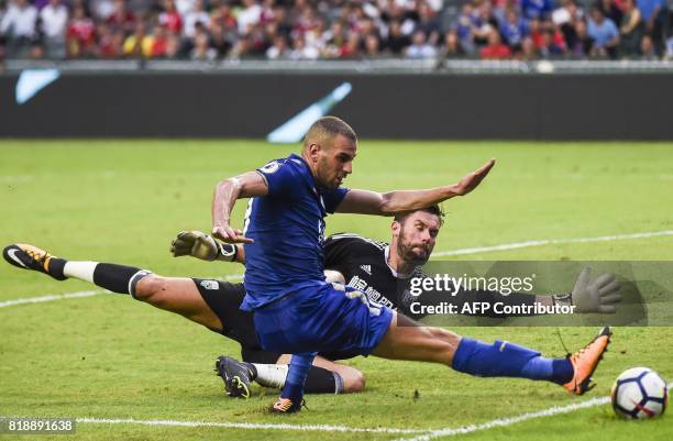 West Bromwich Albion's English goalkeeper Ben Foster blocks a shot on goal by Leicester City's Algerian forward Islam Slimani during the 2017 Premier...