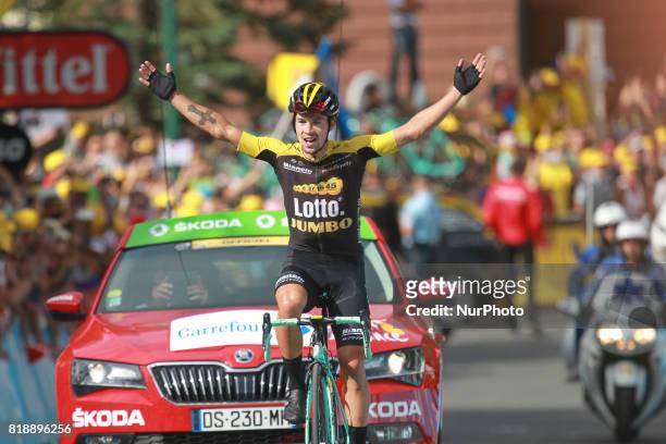 Slovenia's Primoz Roglic celebrates as he crosses the finish line during the 183 km seventeenth stage of the 104th edition of the Tour de France...
