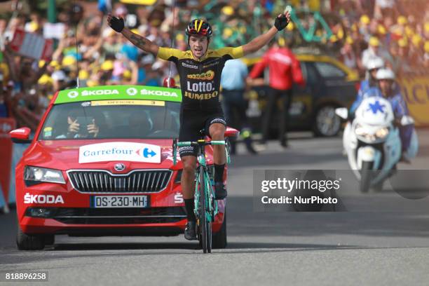 Slovenia's Primoz Roglic celebrates as he crosses the finish line during the 183 km seventeenth stage of the 104th edition of the Tour de France...