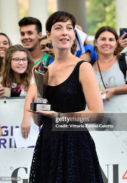 Cristiana Capotondi poses with the Giffoni Award during the Giffoni Film Festival 2017 on July 19, 2017 in Giffoni Valle Piana, Italy.