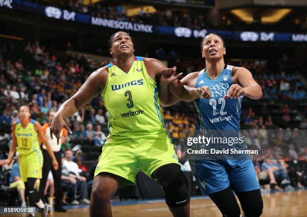 Courtney Paris of the Dallas Wings boxes out Plenette Pierson of the Minnesota Lynx on July 19, 2017 at Xcel Energy Center in St. Paul, Minnesota....