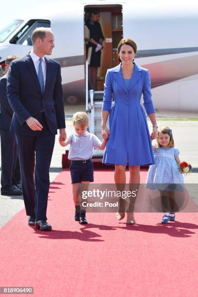 Prince William, Duke of Cambridge, Catherine, Duchess of Cambridge, Prince George of Cambridge and Princess Charlotte of Cambridge arrive at Berlin...