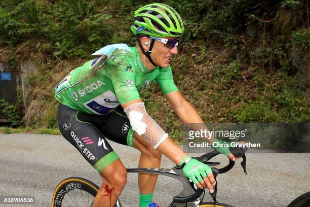 Marcel Kittel of Germany riding for Quick-Step Floors in the green points jersey rides at the back of the peloton after a crash during stage 17 of...