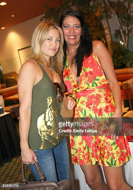 Kate Hudson and Melissa Hazelton of Wrapture Cigars attend the Backstage Creations 2008 American Century Championship Golf Tournament on July 9, 2008...