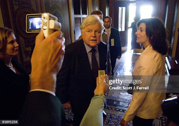 July 09: Sen. Edward M. Kennedy, D-Mass., with wife Victoria at right, exits the U.S. Capitol after voting for the Medicare bill in the Senate. The...