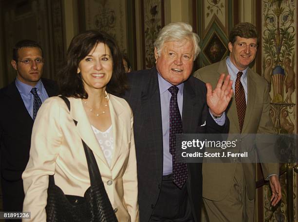 July 09: Sen. Edward M. Kennedy, D-Mass., with wife Victoria, exits the U.S. Capitol after voting for the Medicare bill in the Senate. At far right...