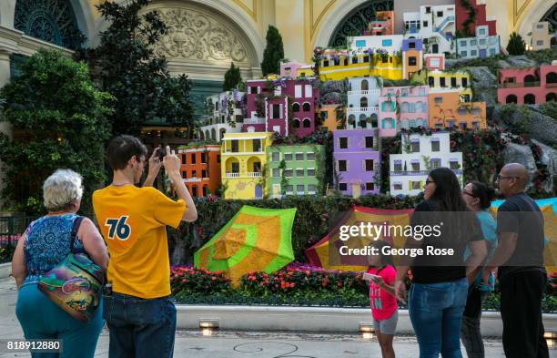 Summer display of flowers and sculptures located off the lobby of the Bellagio Hotel & Casino is viewed on July 13, 2017 in Las Vegas, Nevada....